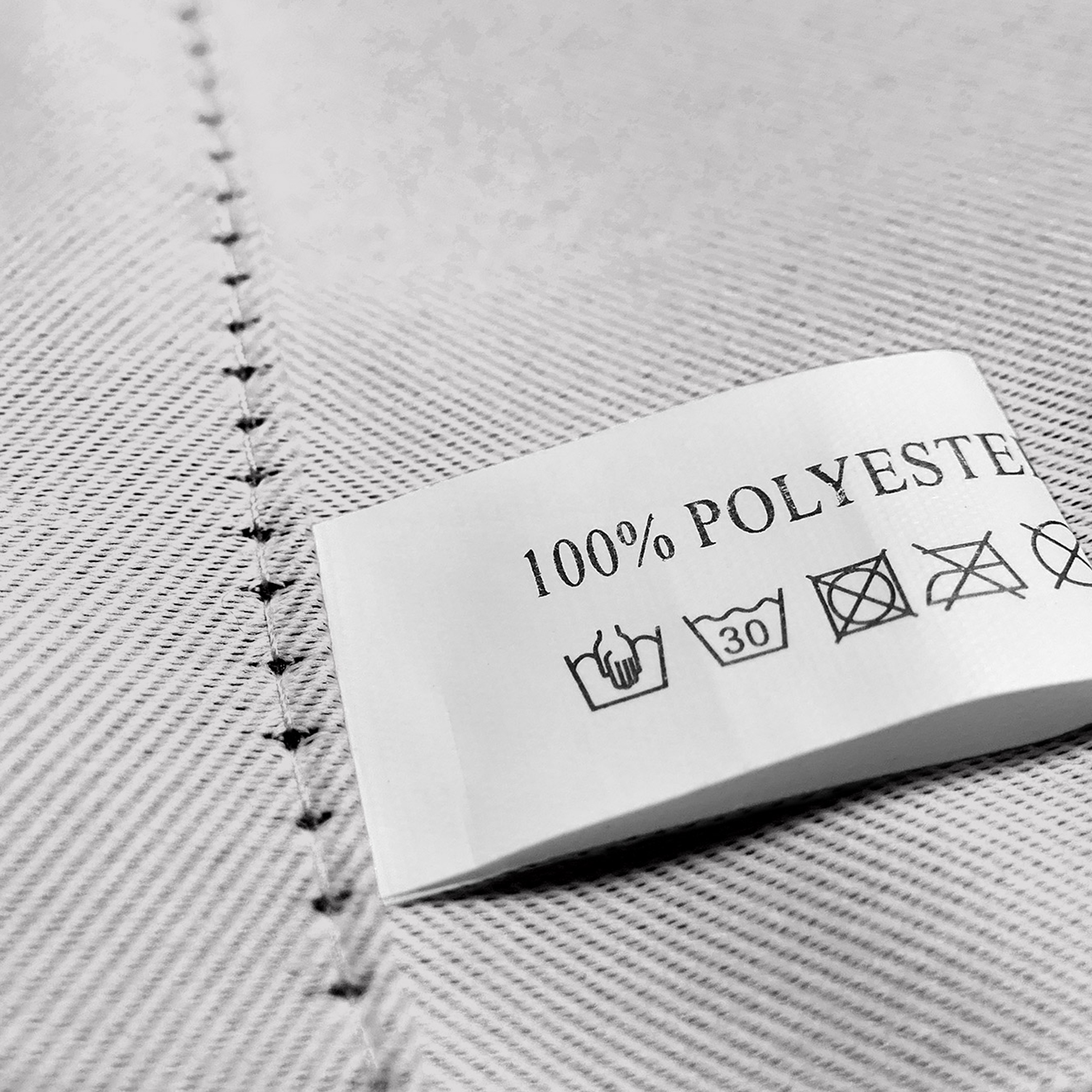 slider_image_27f735c5e8f144d99126f12741a2f857 Etikett auf Vorhang mit Pflegehinweisen und Materialangabe aus Polyester
