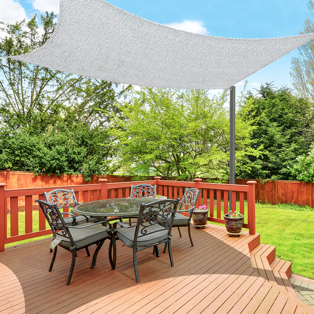 slider_image_f37c4ec8a14646fb9f9fb258adda0408 Terrasse mit Tisch, Stühlen und Sonnensegel im Gartenbereich