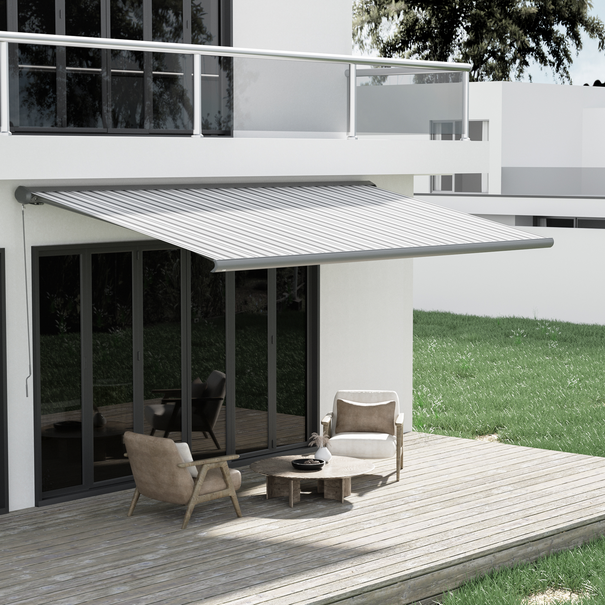 Terrasse mit Markise und Sitzmöbeln vor einem modernen Gebäude