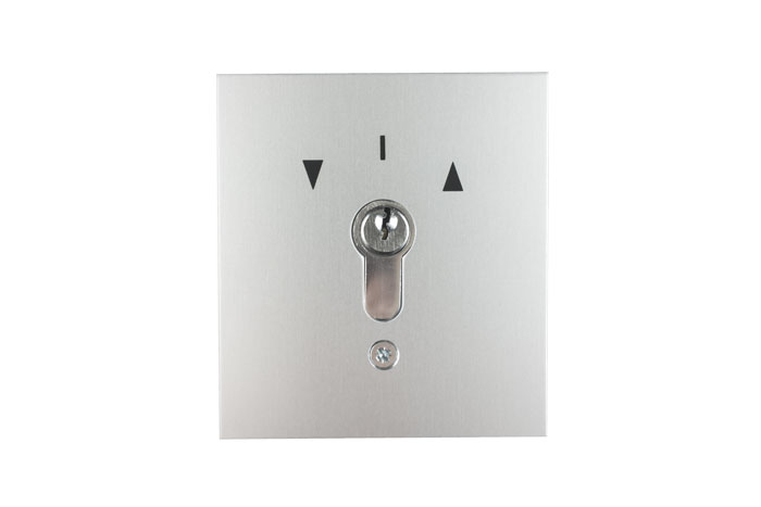 Schlüsselschalter mit Pfeilsymbolen für Auf- und Abwärtsfunktion