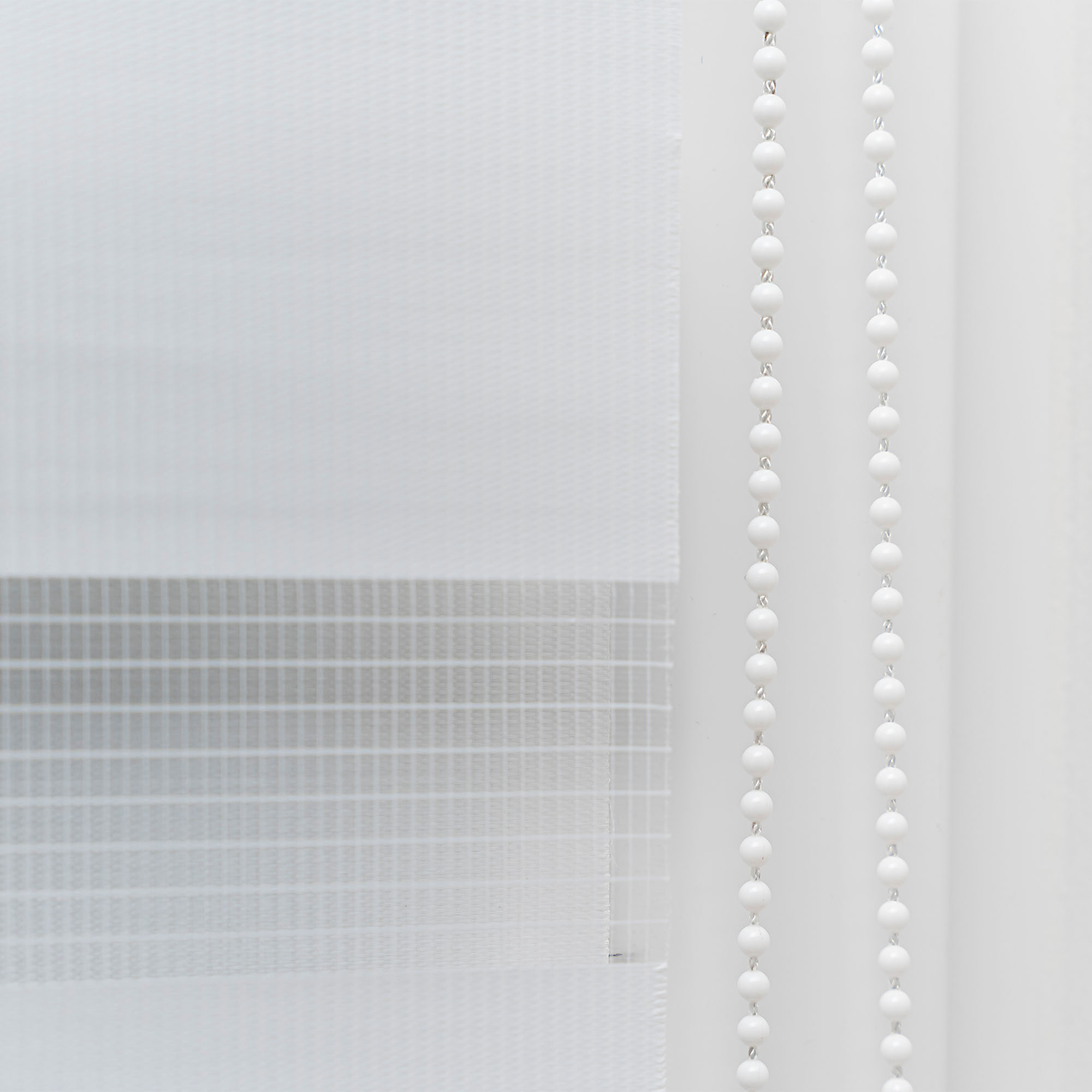 slider_image_7c756b728dbc4a05aaa5ba90d2672c64 Vertikale Jalousie mit Kettenzug, halbtransparentes Material, Detailansicht