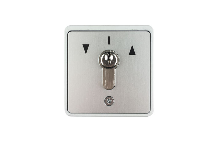 Schlüsselschalter mit Pfeilsymbolen für Auf- und Abwärtsfunktion